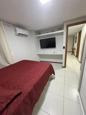 Uma televisão e/ou sistema de entretenimento em Apartamento Aquiraz Resort Catu Lake