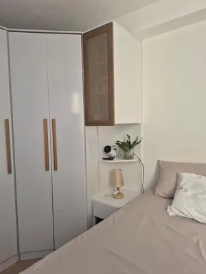 Uma cama ou camas num quarto em Apto completo na praia