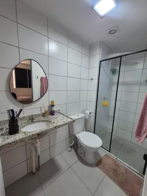 Uma casa de banho em Apto completo na praia