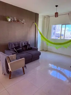 Uma área de estar em Ap Próx Crocobeach Completo