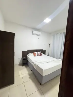 Uma cama ou camas num quarto em Luau da Taiba apartment
