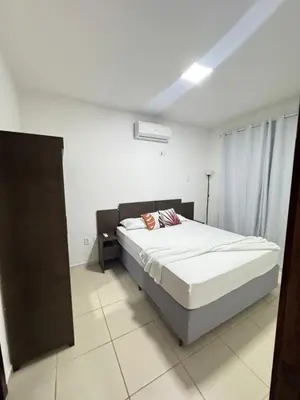 Uma cama ou camas num quarto em Luau da Taiba apartment