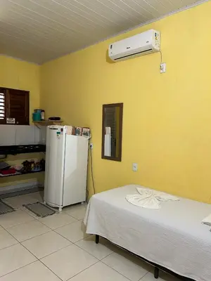 A cozinha ou kitchenette de Chalés brisa do mar