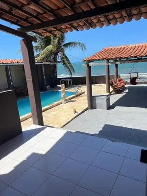 A piscina em ou perto de Casa de praia de frente para o mar