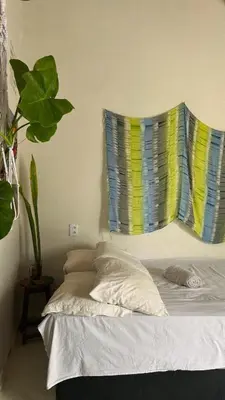 Uma cama ou camas num quarto em Chalé blue