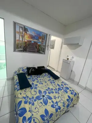 Uma cama ou camas num quarto em Loft Praia do Futuro Croco Beach
