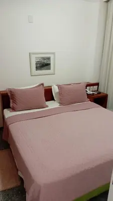 Uma cama ou camas num quarto em Beira Mar Breeze Apartment