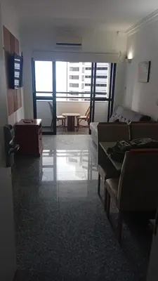 Uma área de estar em Beira Mar Breeze Apartment