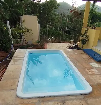 A piscina em ou perto de Chalé nas nuvens