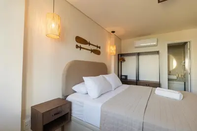Uma cama ou camas num quarto em Apto moderno prox à Beira Mar de Fortaleza