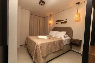 Uma cama ou camas num quarto em Apto moderno prox à Beira Mar de Fortaleza