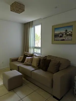 Uma área de estar em Cobertura duplex no Porto das Dunas