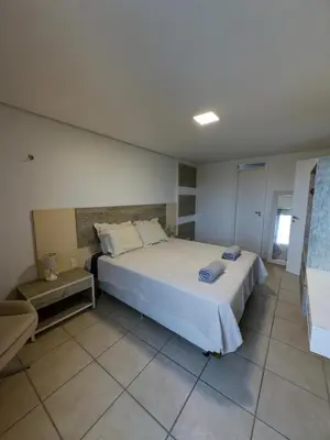 Uma cama ou camas num quarto em Cobertura duplex no Porto das Dunas