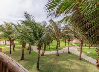 Um jardim no exterior de VG Sun #206 Beira Mar no Cumbuco By Carpediem