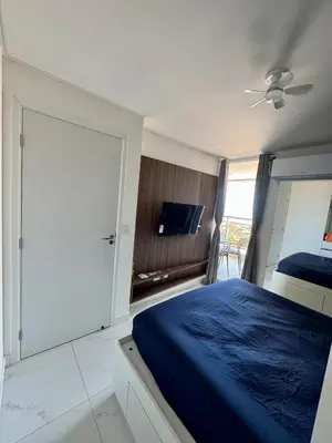 Uma cama ou camas num quarto em Apartamento na Praia de Iracema