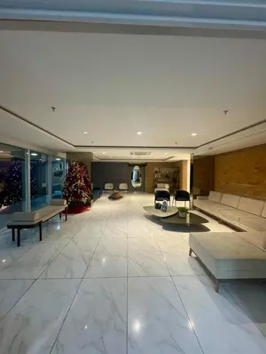 Uma área de estar em Apartamento na Praia de Iracema
