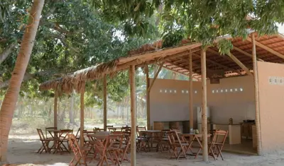 Um restaurante ou outro lugar para comer em Bio-Resort Camping
