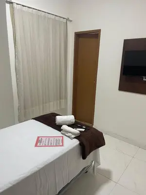 Uma cama ou camas num quarto em Hotel complexo paris