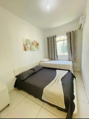 Uma cama ou camas num quarto em Apartamento 218, primeiro andar, Canoa Quebrada