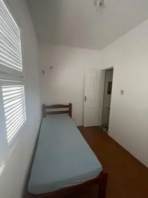 Uma cama ou camas num quarto em Casa de Praia