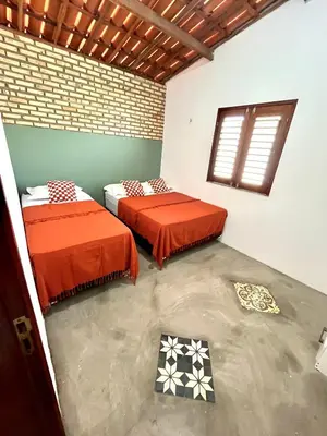 Uma cama ou camas num quarto em Chalé Vila da Volta
