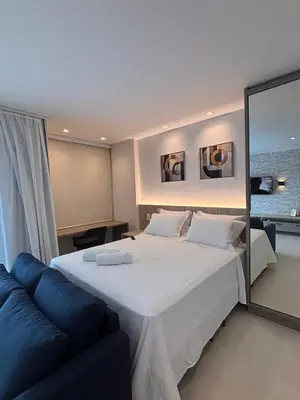 Uma cama ou camas num quarto em Exclusividade e Conforto a 500m da Beira-Mar