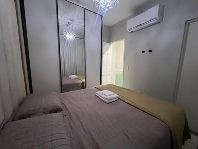 Uma cama ou camas num quarto em Casa Maia Eusébio