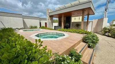 A piscina em ou perto de Casa nova em condomínio com acesso à praia