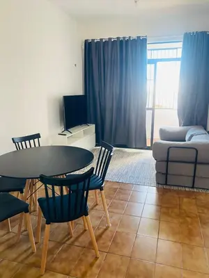 Uma televisão e/ou sistema de entretenimento em Apartamento completo para familia com dois quartos 304