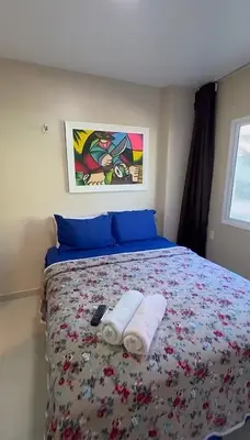Uma cama ou camas num quarto em Vg Fun 142