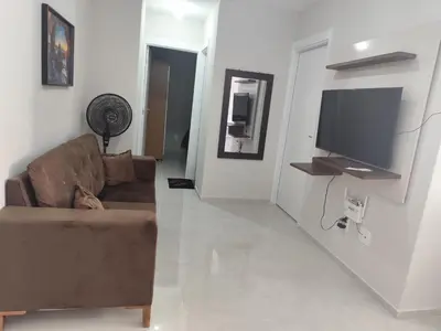 Uma televisão e/ou sistema de entretenimento em Ap novo na praia do futuro