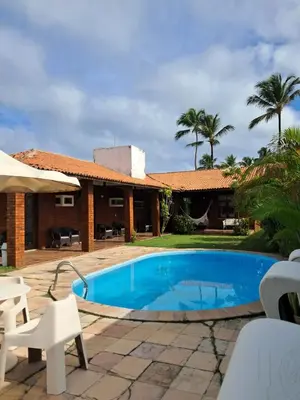 A piscina em ou perto de Pousada Brisa do Oceano Cumbuco - Quartos privativos e acomodações compartilhadas