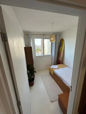 Uma cama ou camas num quarto em Apartment with ocean view