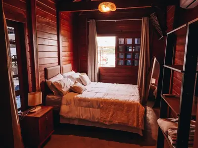 Uma cama ou camas num quarto em Lagoon Paradise