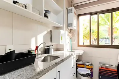 A cozinha ou kitchenette de Bungalo Frente Mar N 101