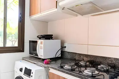 A cozinha ou kitchenette de Bungalo Frente Mar N 101