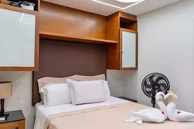 Uma cama ou camas num quarto em Bungalo Frente Mar N 101