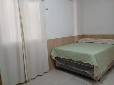 Uma cama ou camas num quarto em AP Morro Branco
