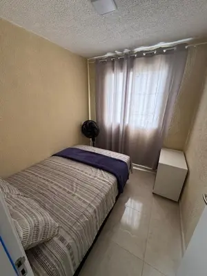 Uma cama ou camas num quarto em Apartamento pé na areia- Praia do futuro