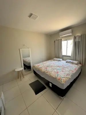 Uma cama ou camas num quarto em Casa com piscina privativa em paracuru