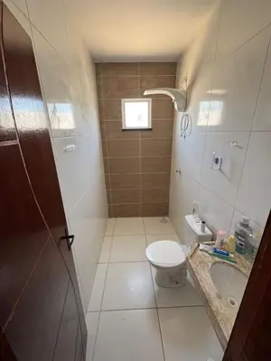 Uma casa de banho em Casa com piscina privativa em paracuru