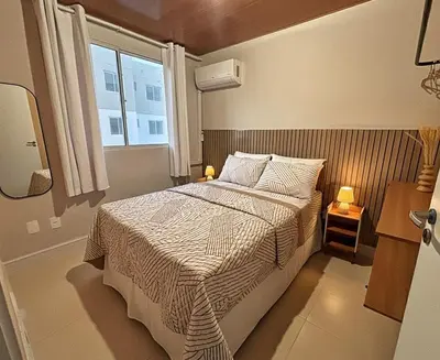 Uma cama ou camas num quarto em Apartamento Pé na Areia Praia do Futuro Fortaleza
