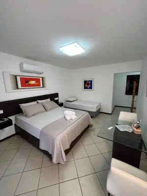 Uma cama ou camas num quarto em Casa Kite Academy