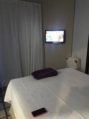 Uma cama ou camas num quarto em Hotel Golden Fortaleza para vista mar