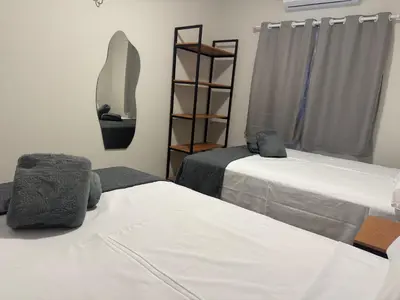 Uma cama ou camas num quarto em Sunset House Canoa Quebrada