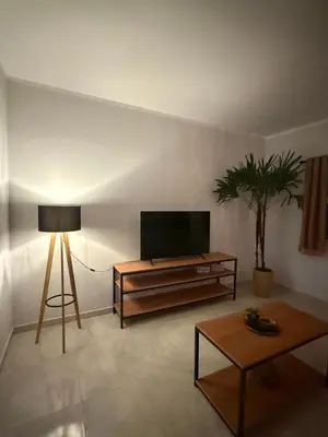 Uma televisão e/ou sistema de entretenimento em Sunset House Canoa Quebrada