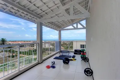 Uma varanda ou terraço em Beach Townhouses I Triplex Perto da Praia By Carpediem