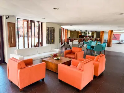 Uma área de estar em Kariri beach apt 427 Praia do Cumbuco