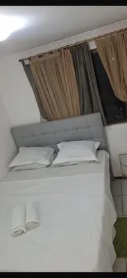 Uma cama ou camas num quarto em Sol &praia