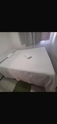Uma cama ou camas num quarto em Sol &praia